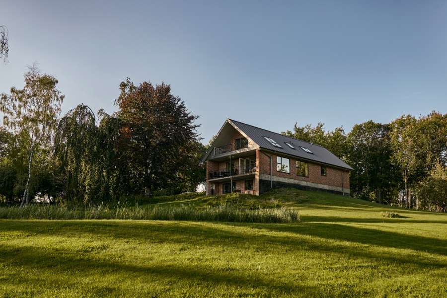 Summer light settles over steel profiles in the forest, Klæstruplundvej 11, 9240 Nibe, Denmark